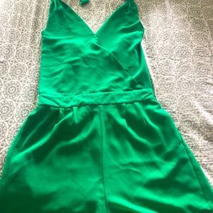 Green romper new never been worn